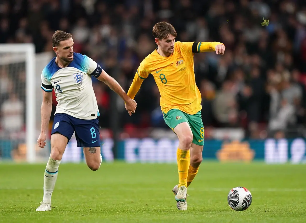 Jordan Henderson, left, was booed by England fans