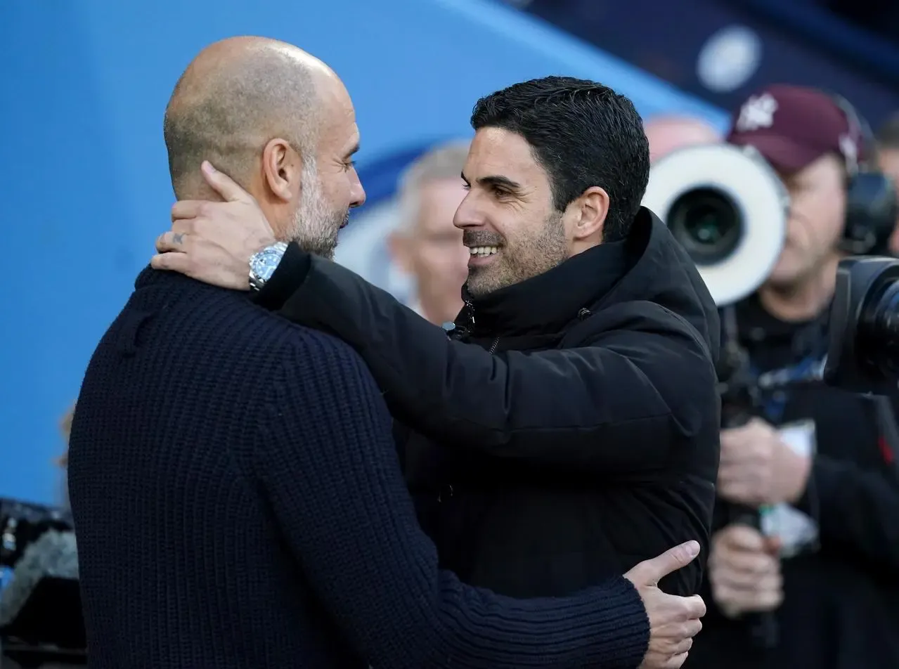 Pep Guardiola, left, was full of praise for Arsenal boss Mikel Arteta (Martin Rickett/PA)