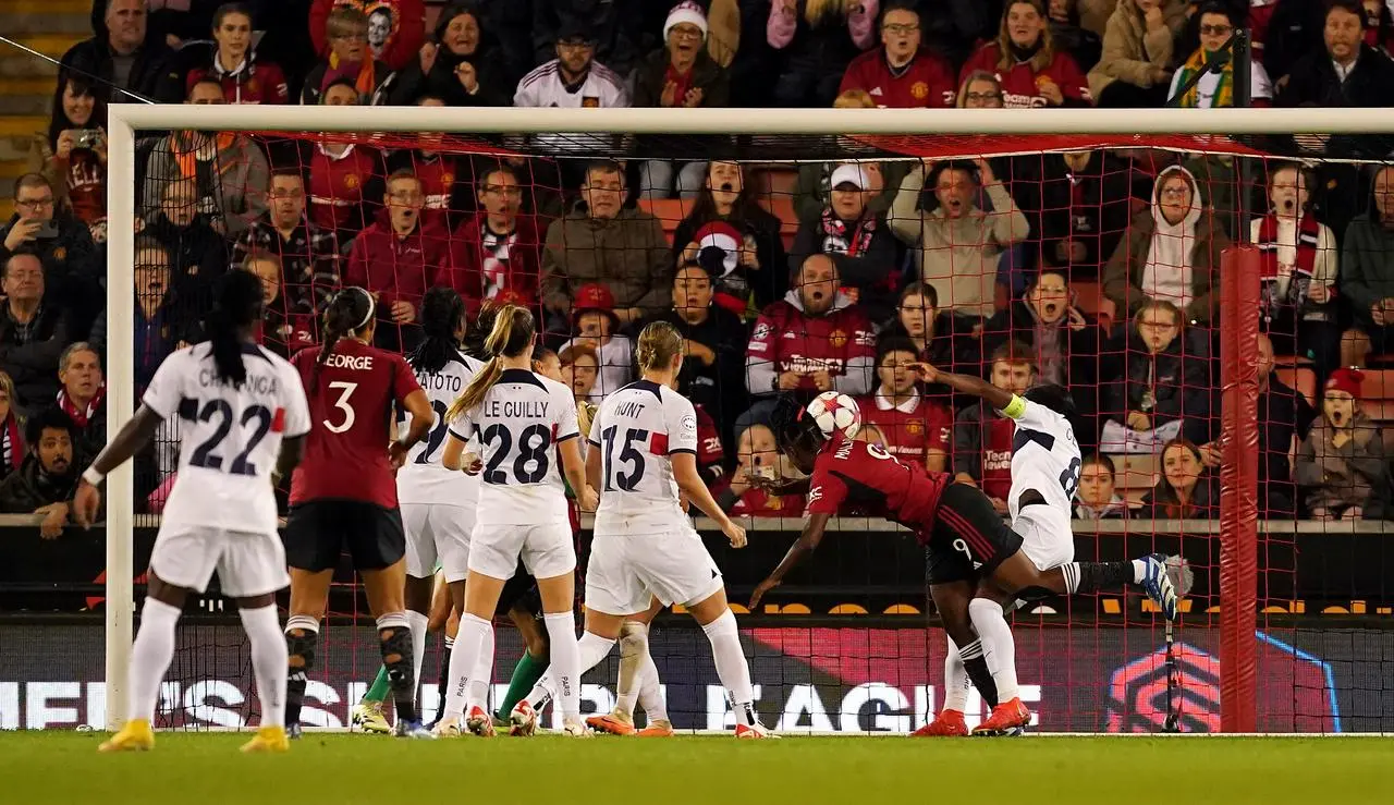 Melvine Malard, second right, scores Manchester United's equaliser