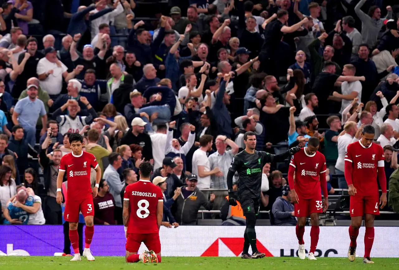 Liverpool's Wataru Endo, Dominik Szoboszlai, Alisson Becker, Joel Matip and Virgil van Dijk react after Matip's own goal