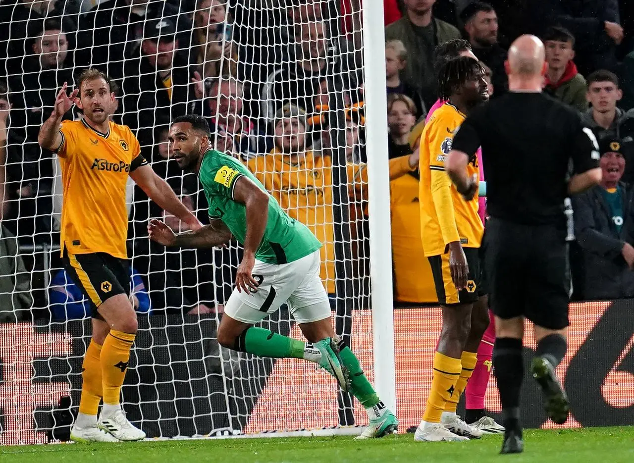 Callum Wilson, centre, celebrates his first goal