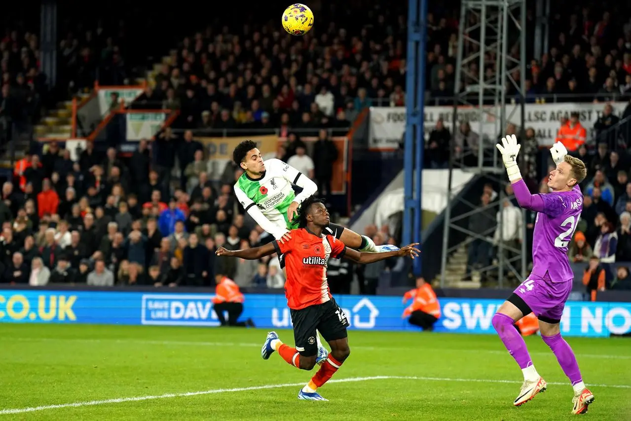 Luis Diaz heads in Liverpool's leveller against Luton