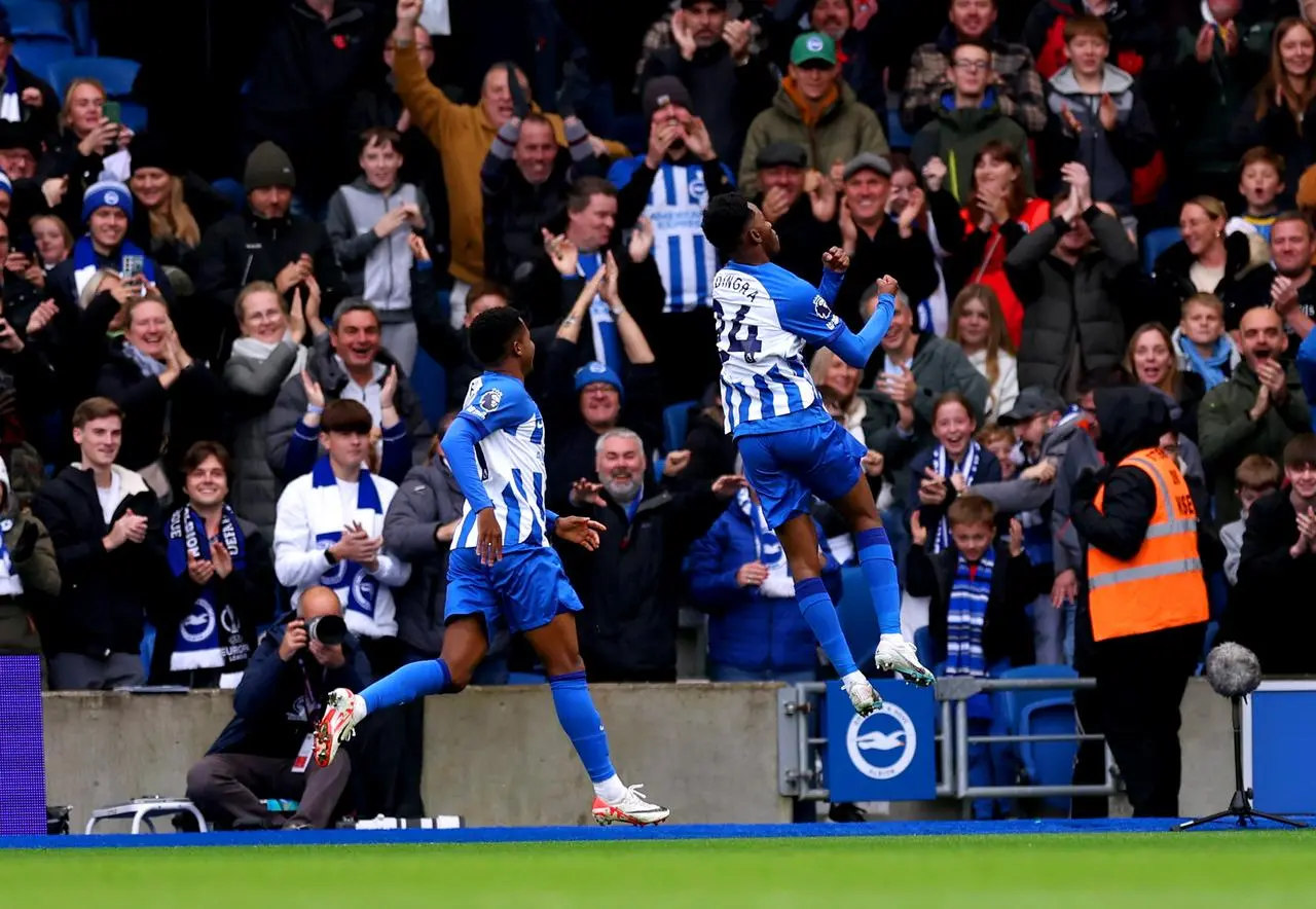 Simon Adingra, right, celebrates his opener against Sheffield United