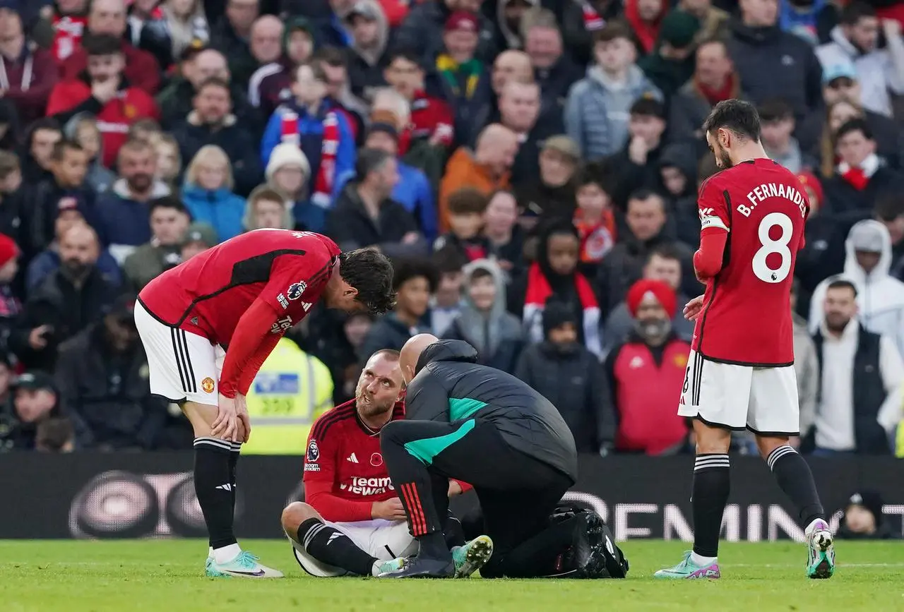 Christian Eriksen, centre, is set for a month out (Martin Rickett/PA)