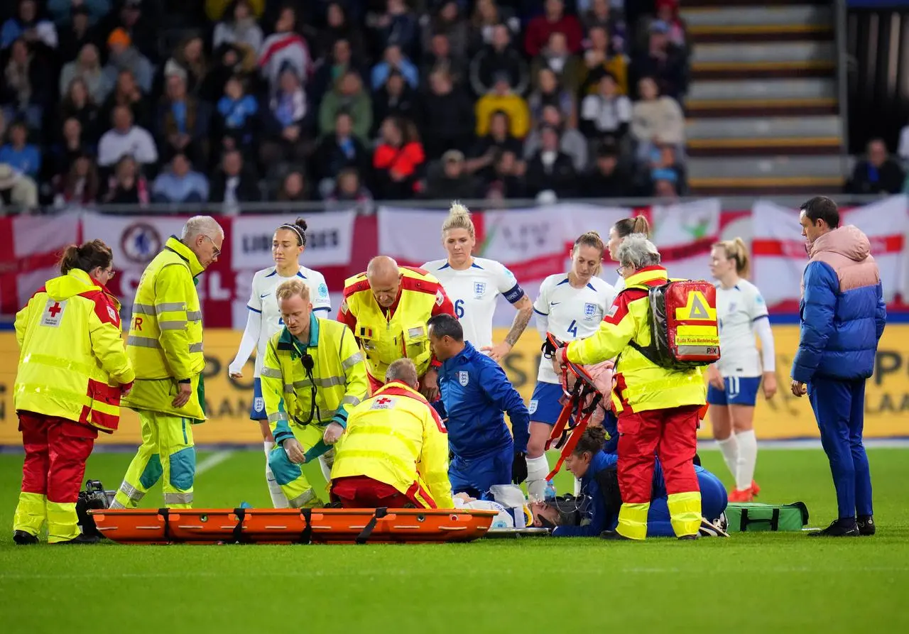 Alex Greenwood was carried off on a stretcher in England's defeat in Belgium (Rene Nijhuis/PA)