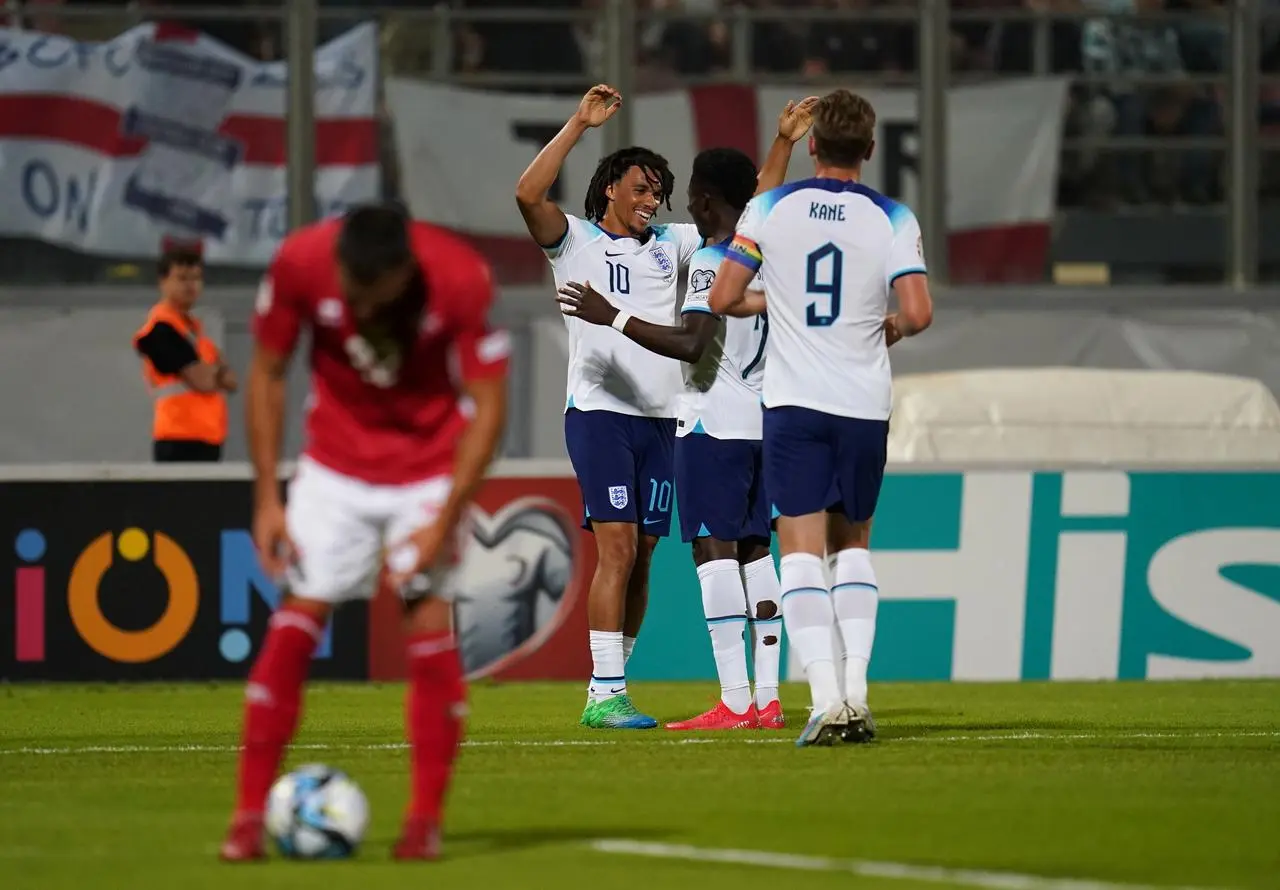 Trent Alexander-Arnold (left) celebrates scoring England's second goal in their win in Malta