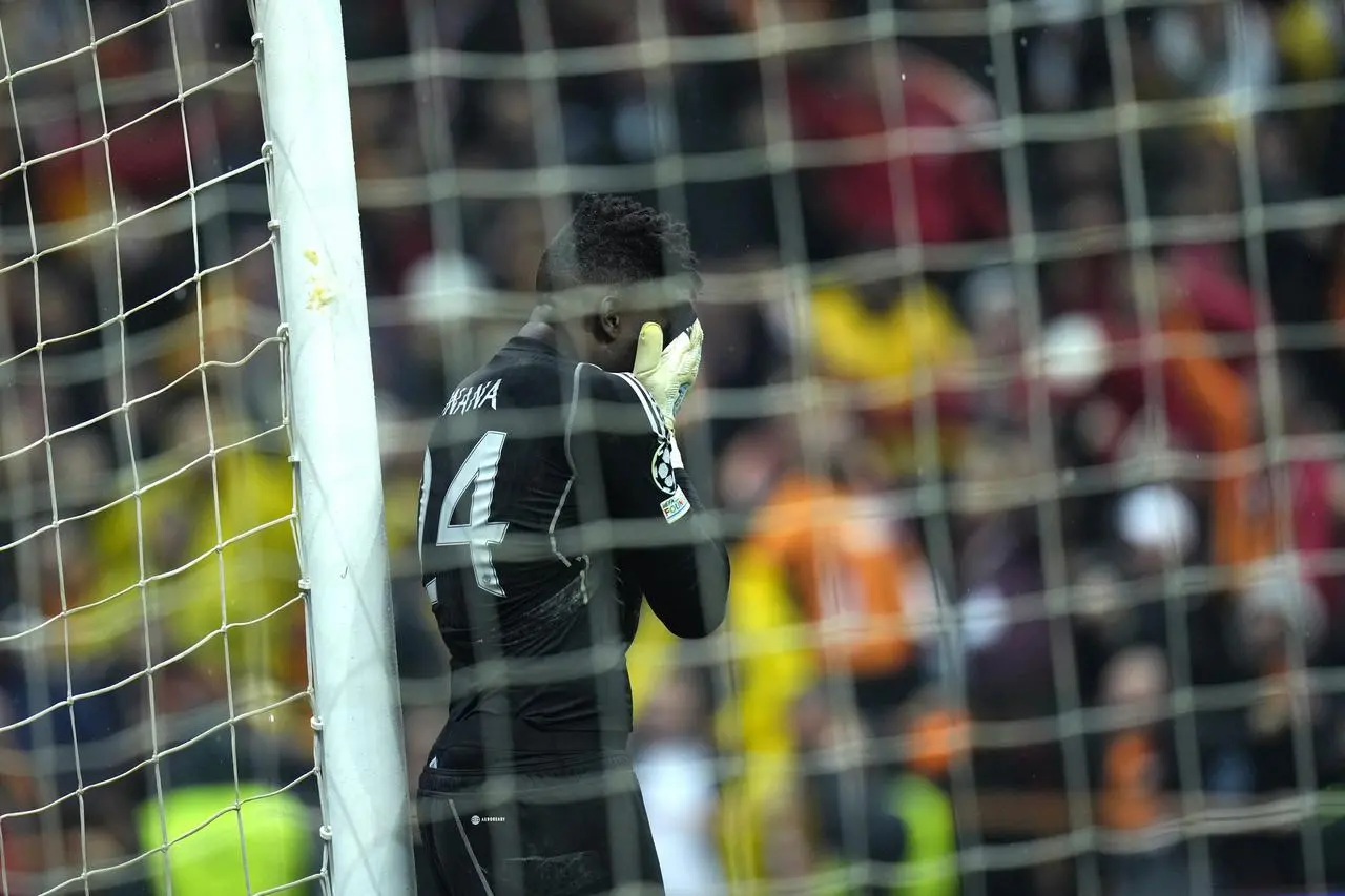 Manchester United’s goalkeeper Andre Onana reacts after conceding (Francisco Seco/AP)