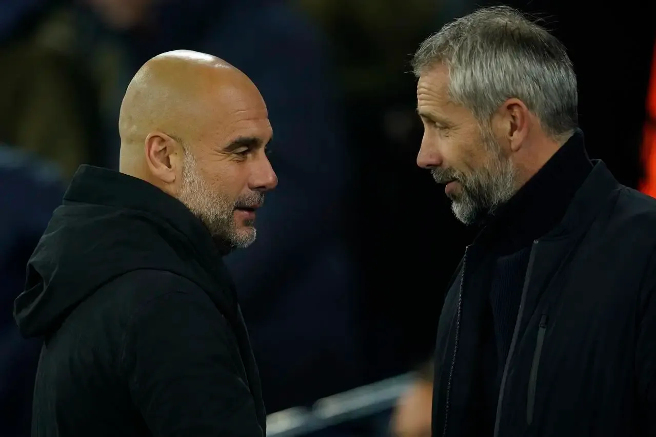 Marco Rose, right, greets Pep Guardiola pre-match