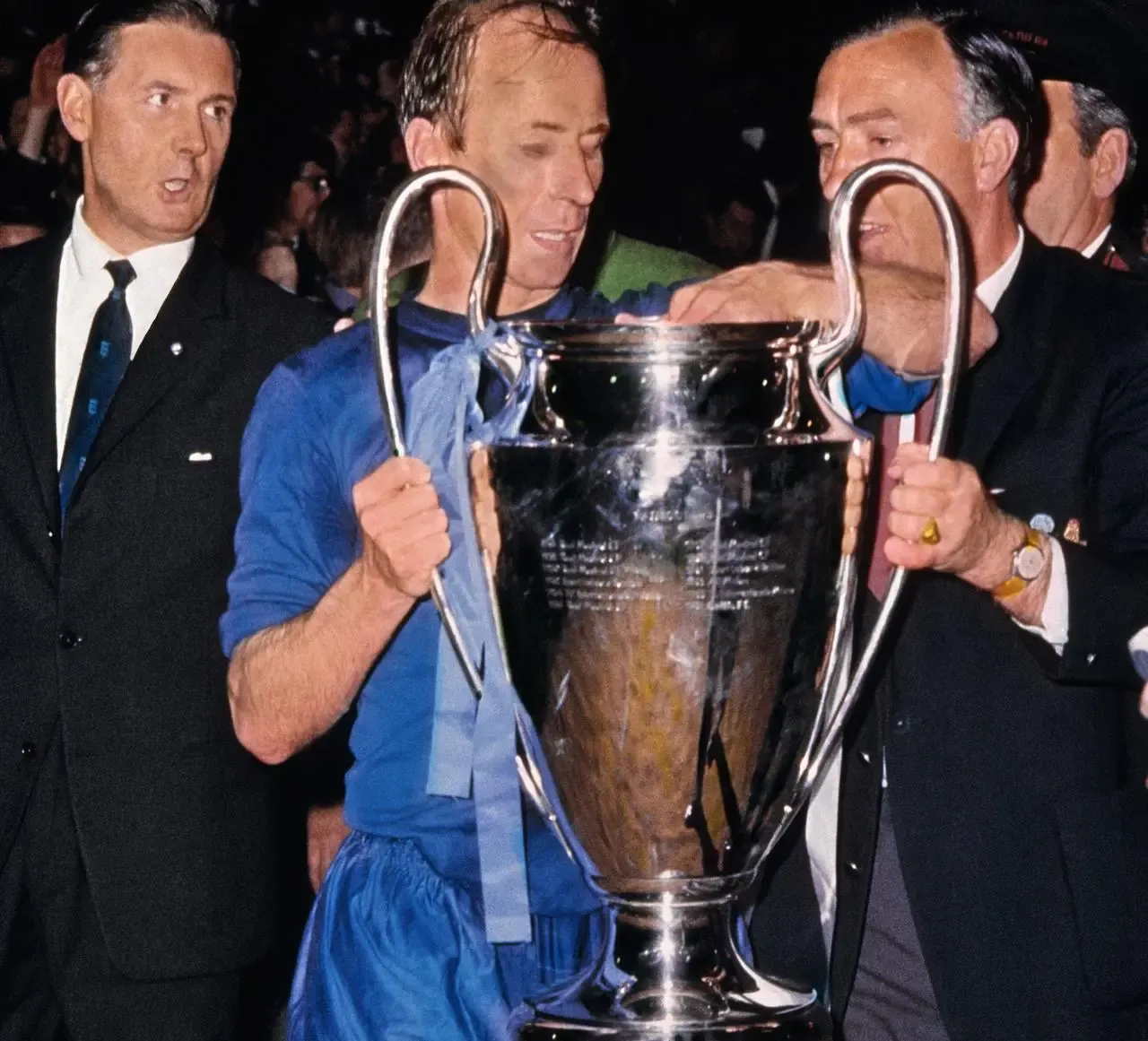 Manchester United’s Bobby Charlton lifts the European Cup