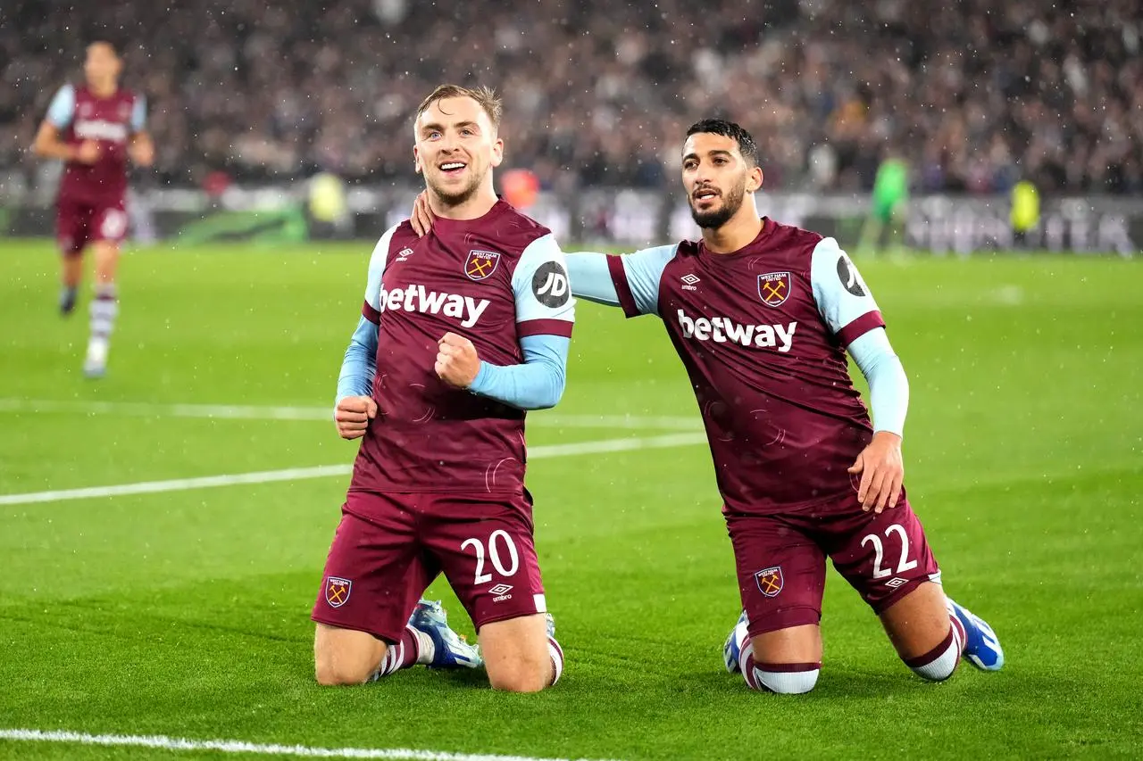 Jarrod Bowen (left) celebrates scoring West Ham's third goal