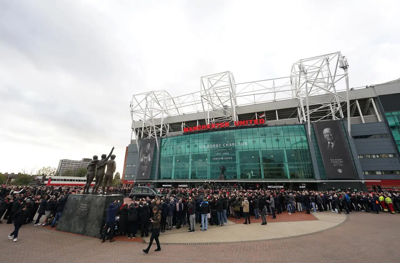 The funeral procession arrives outside Old Trafford (David Davies/PA)