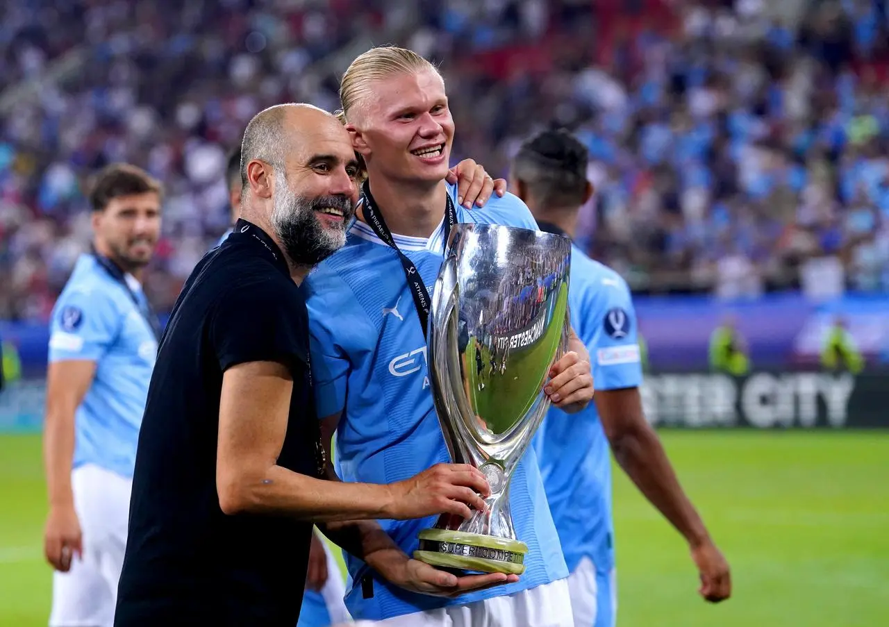 Pep Guardiola and Erling Haaland