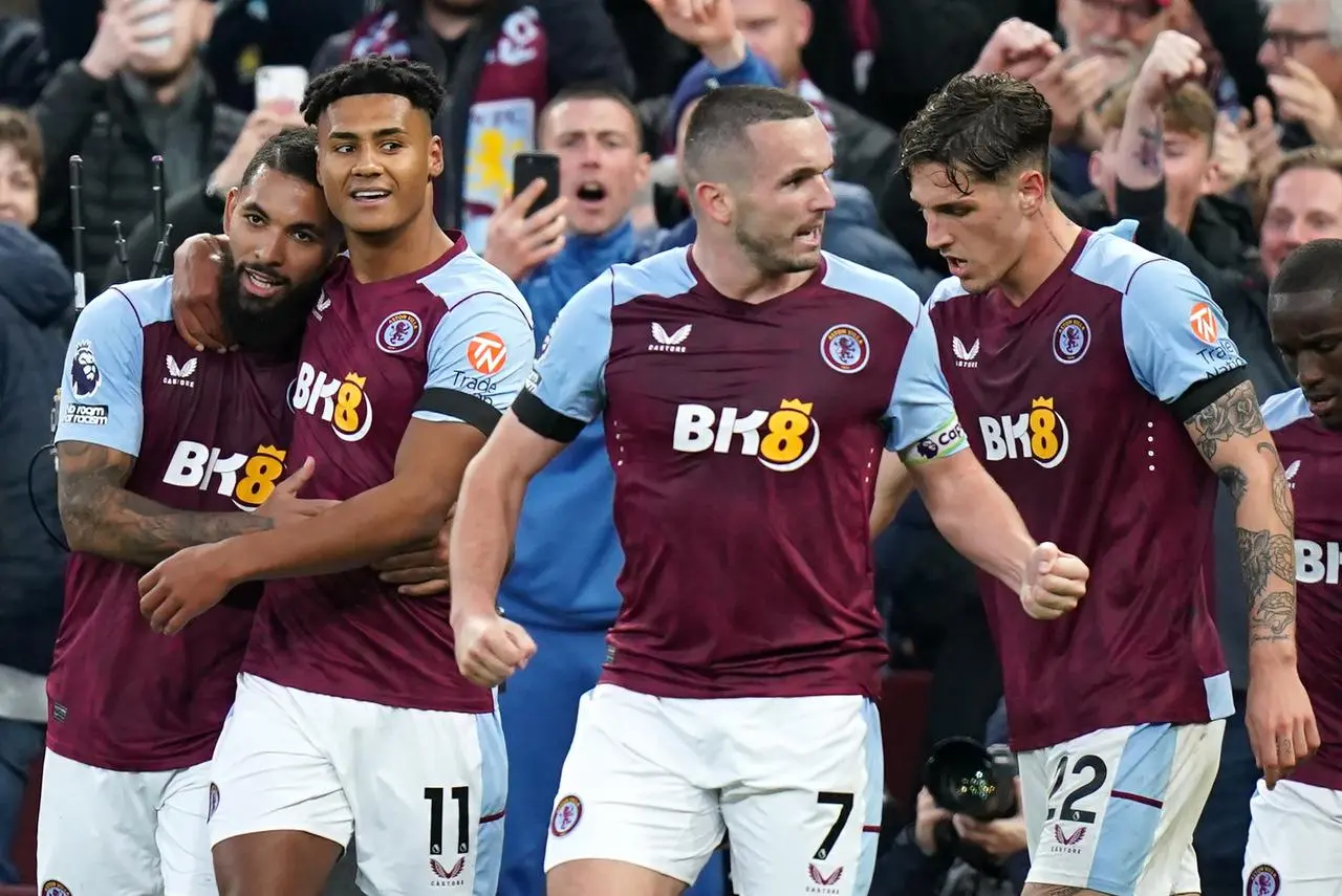 Ollie Watkins, second left, celebrates a goal with Aston Villa team-mates, from left, Douglas Luiz, John McGinn and Nicolo Zaniolo