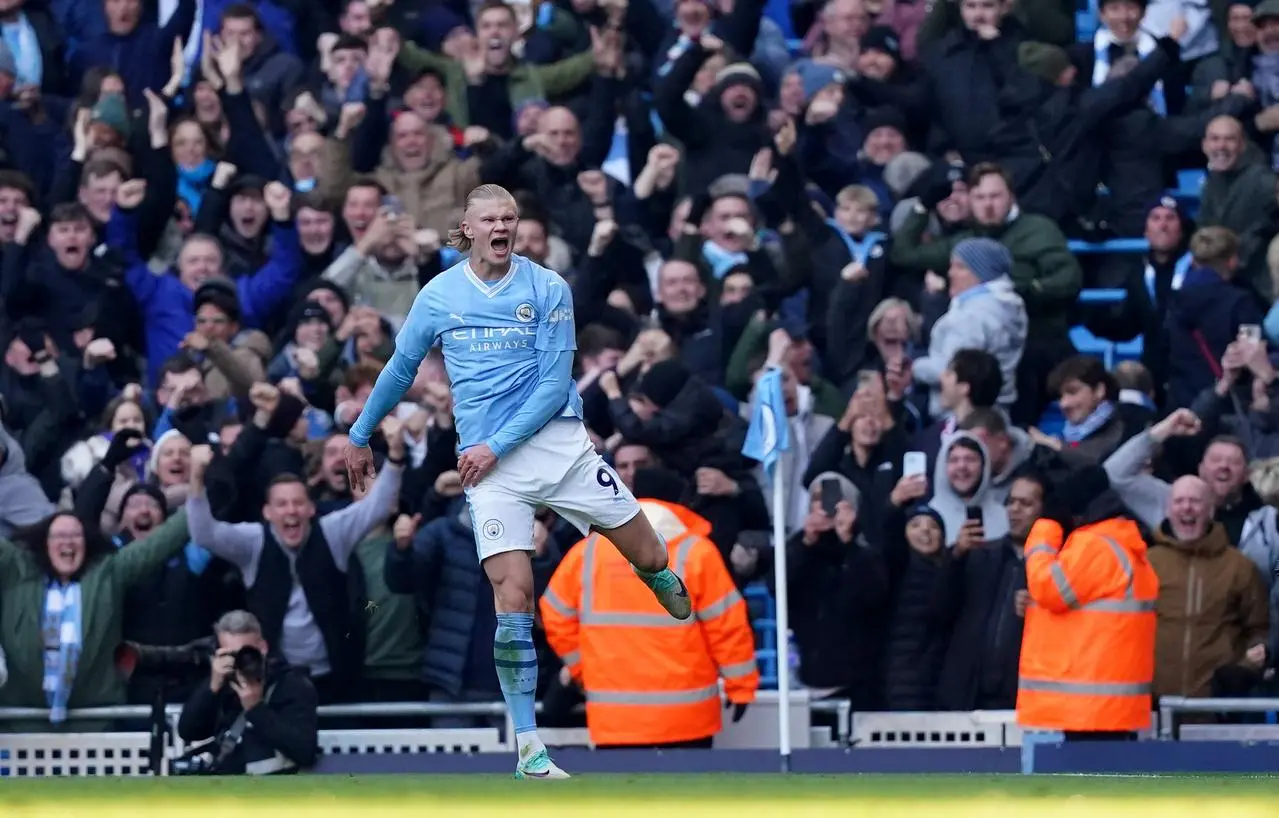 Erling Haaland celebrates scoring against Liverpool