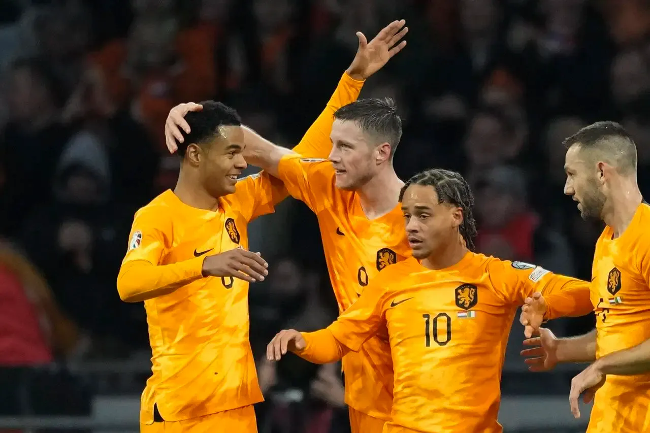 Wout Weghorst, second left, scored the only goal of the game in Amsterdam