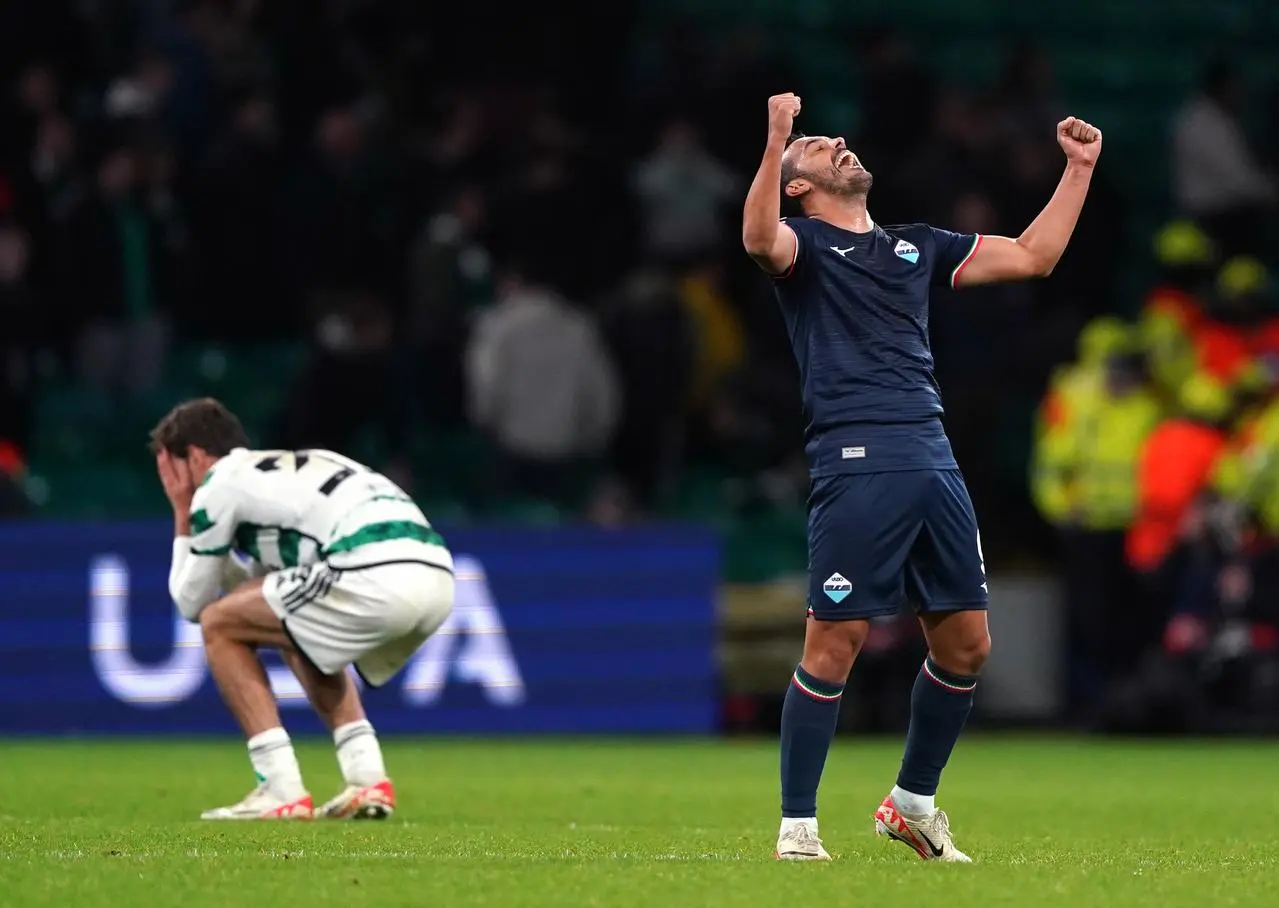 Lazio’s Pedro, right, celebrates his stoppage-time winner at Celtic Park