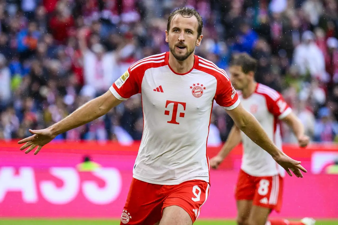 Harry Kane celebrates his first goal against Augsburg in August