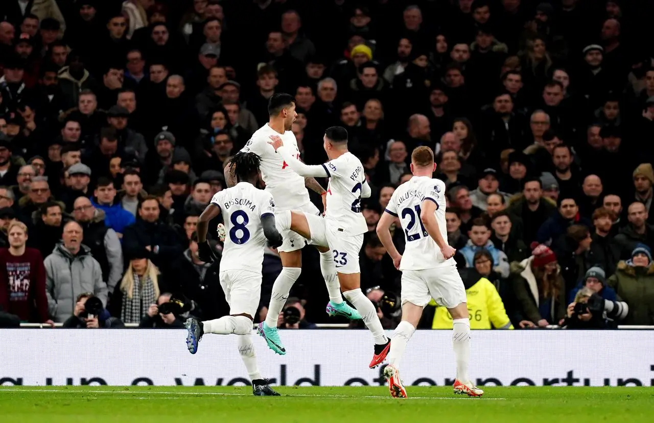 Cristian Romero celebrates the opening goal