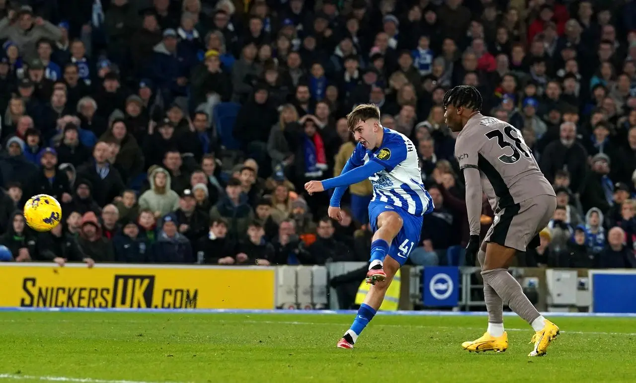 Jack Hinshelwood, left, scores Brighton’s first goal