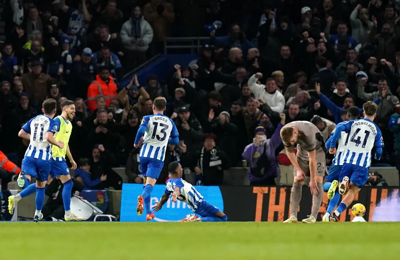 Pervis Estupinan, centre, celebrates after scoring Brighton’s third goal