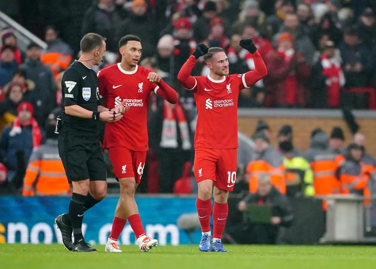 Alexis Mac Allister (right) celebrates for Liverpool