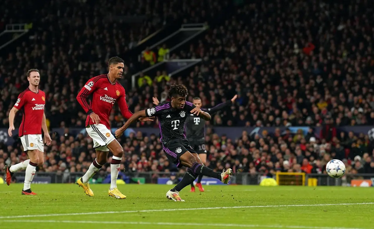 Kingsley Coman, right, scores Bayern Munich’s winner