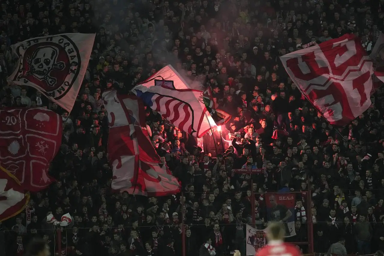 Red Star Belgrade supporters set off flares 