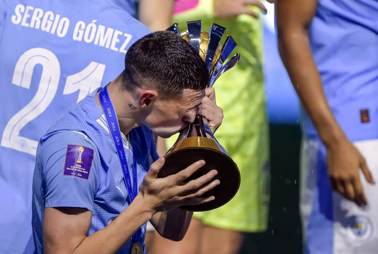 Phil Foden kisses the Club World Cup