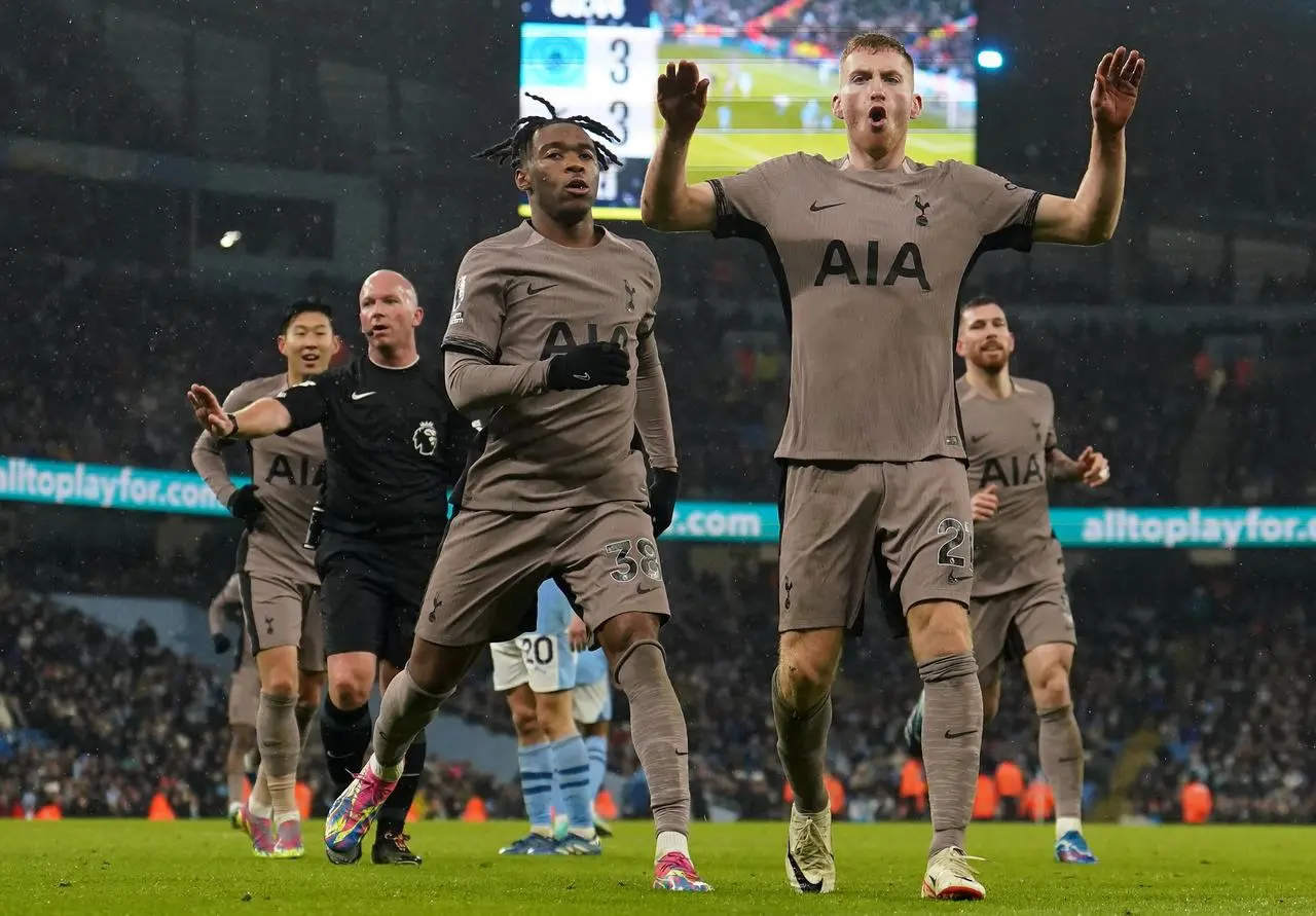 Tottenham Hotspur’s Dejan Kulusevski (right) celebrates scoring