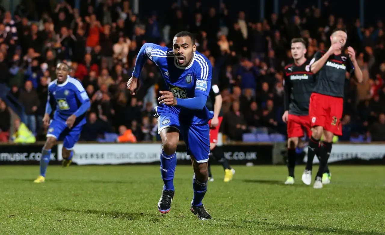 Matthew Barnes-Homer celebrates his winner for Macclesfield against Cardiff in the 2013 FA Cup