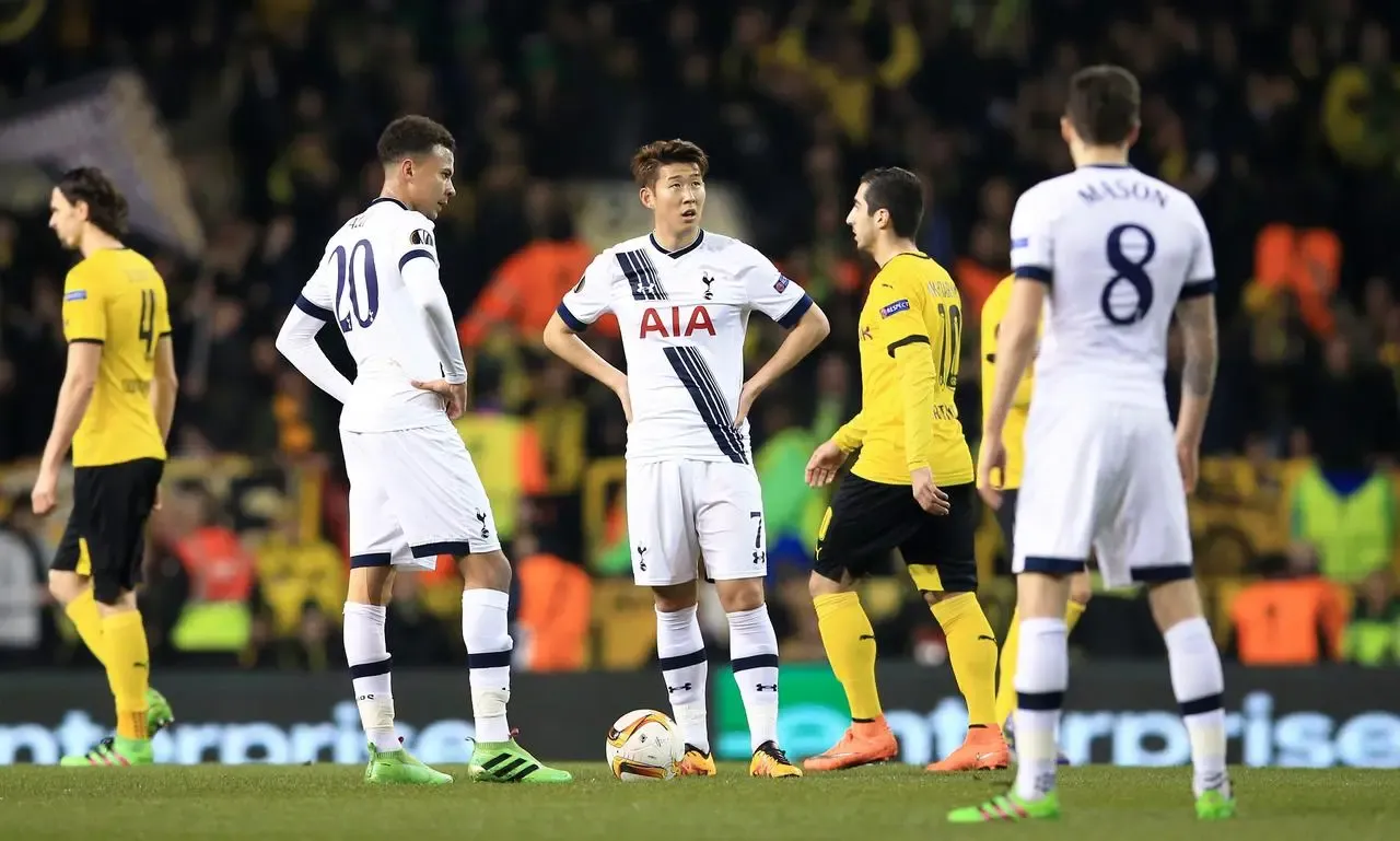 Tottenham Hotspur’s Dele Alli (left) and Son Heung-Min (centre) dejected after Borussia Dortmund’s Pierre-Emerick Aubameyang scores their first goal of the game during the Europa League match at White Hart Lane
