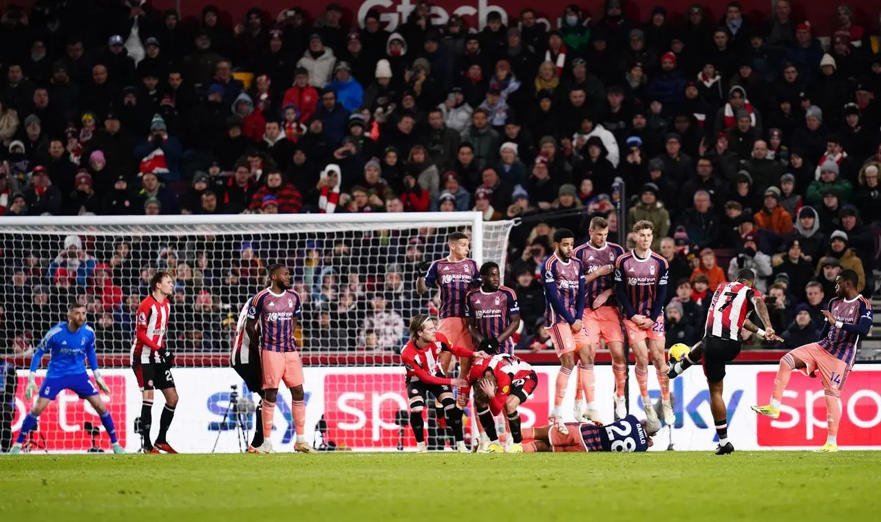 Toney curls in the free-kick to give Brentford the lead against Forest