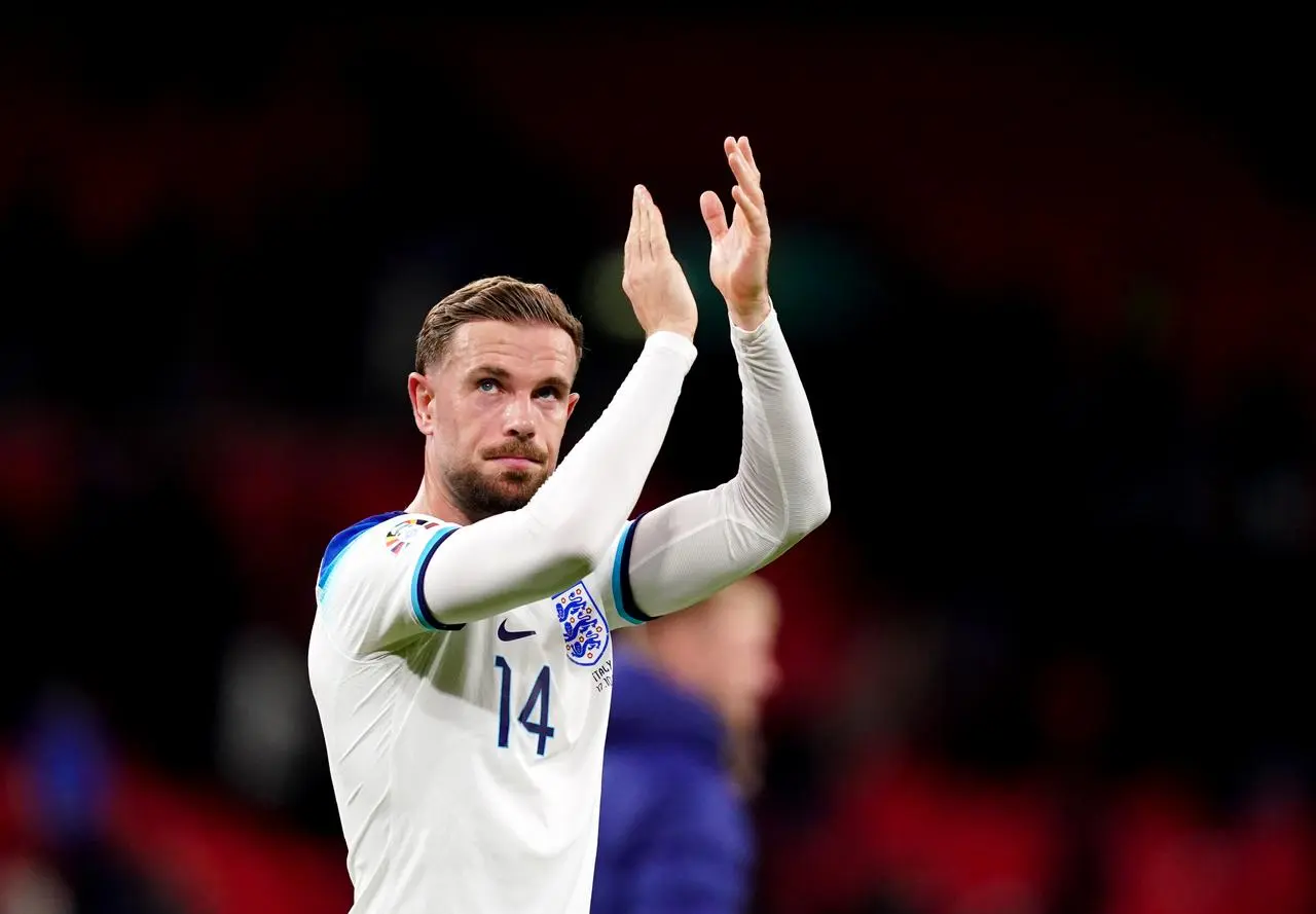 England midfielder Jordan Henderson applauds the fans