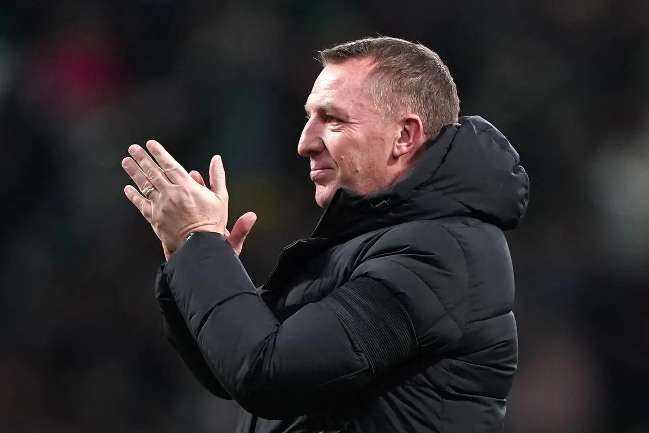 Brendan Rodgers applauds the fans after victory over Buckie Thistle