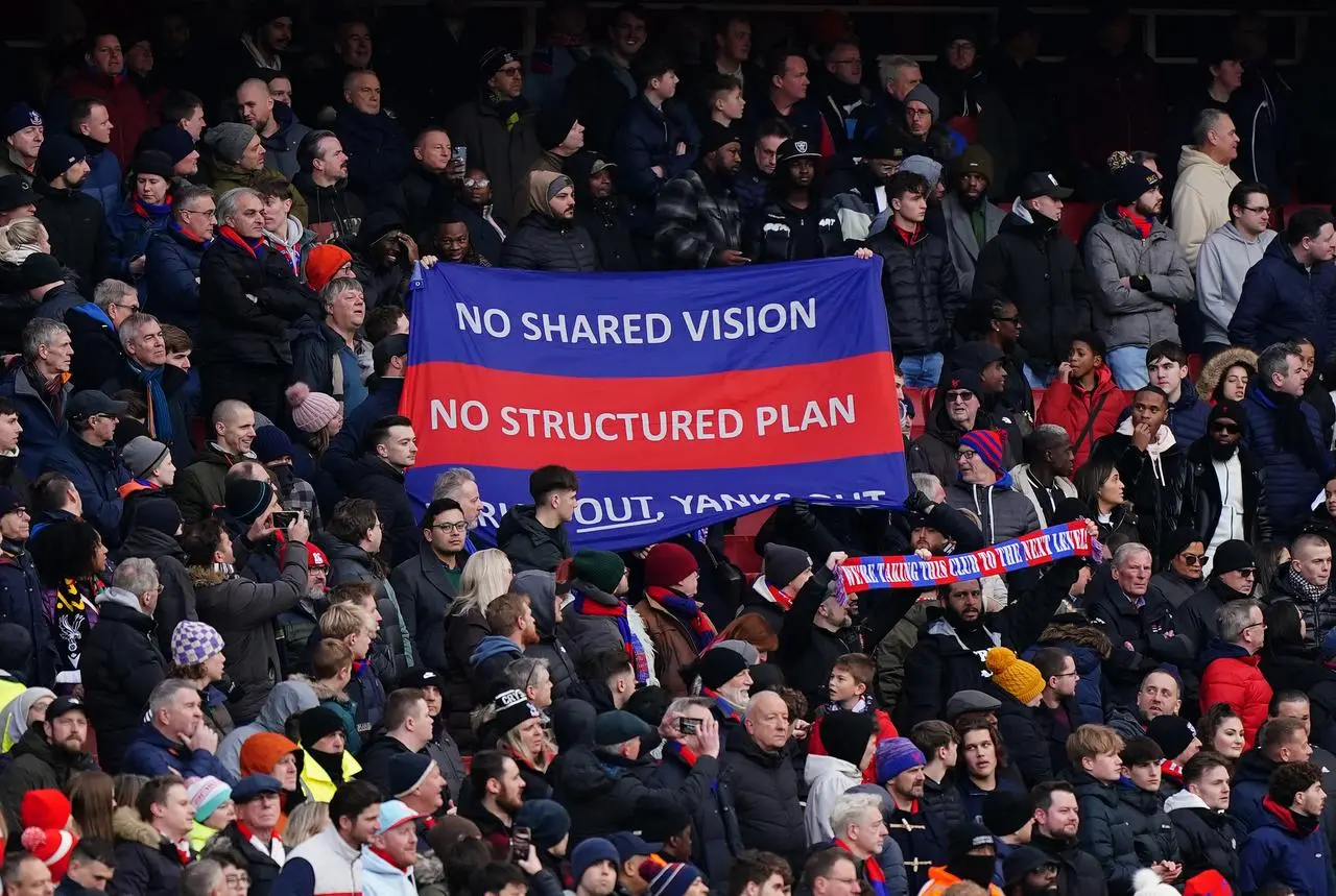 Another banner in the away end at the Emirates Stadium criticised the running of Palace