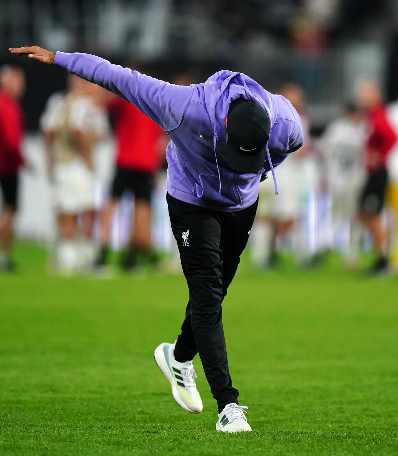 Jurgen Klopp bows to the fans after a Europa League win over LASK