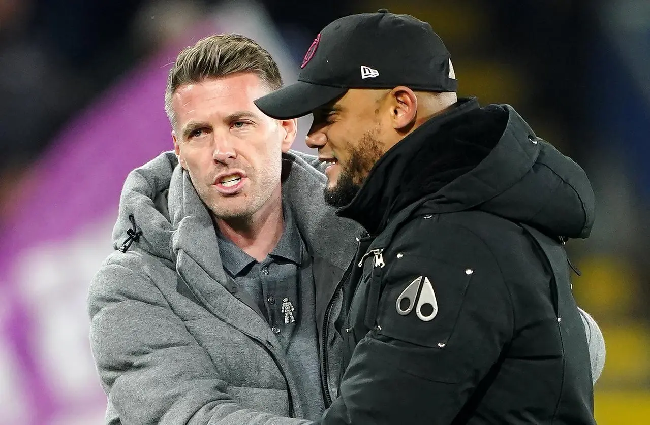 Luton manager Rob Edwards, left, with Vincent Kompany