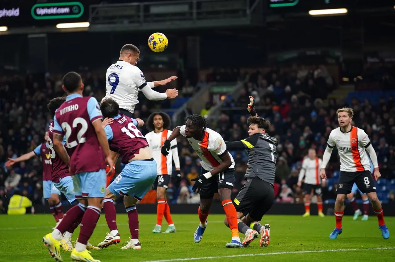 Morris equalises in the second minute of stoppage time (Peter Byrne/PA)