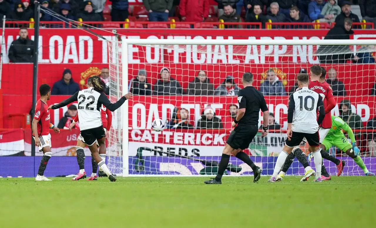 Alex Iwobi scores against Manchester United