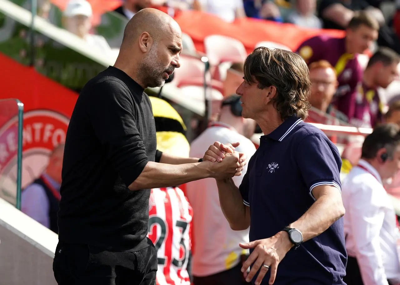 Pep Guardiola and Thomas Frank