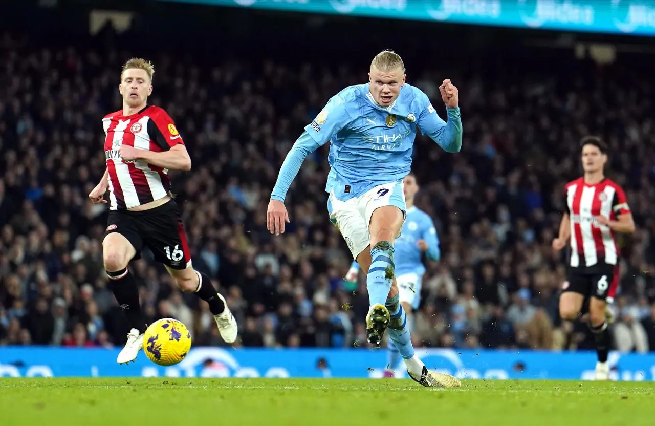 Erling Haaland, right, scores Manchester City's winner against Brentford