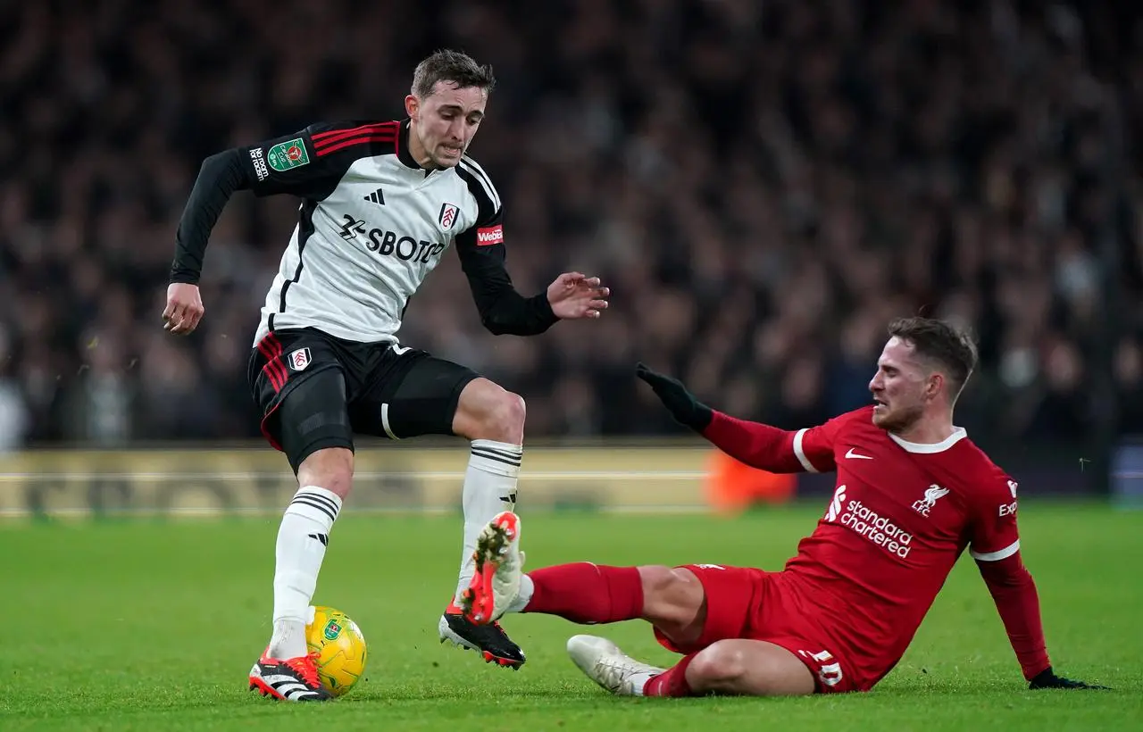 Fulham’s Timothy Castagne and Liverpool’s Alexis Mac Allister 