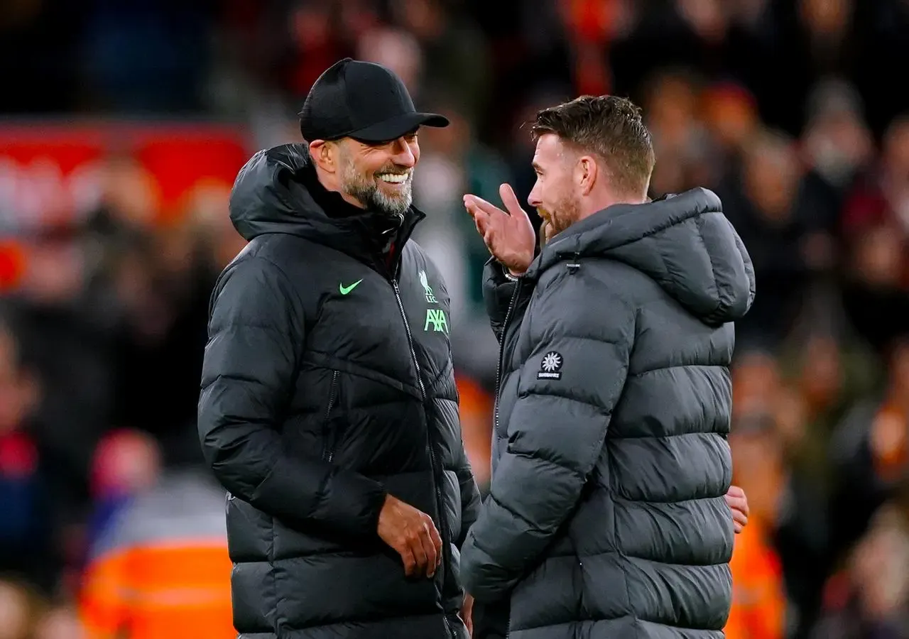 Jurgen Klopp, left, and Rob Edwards