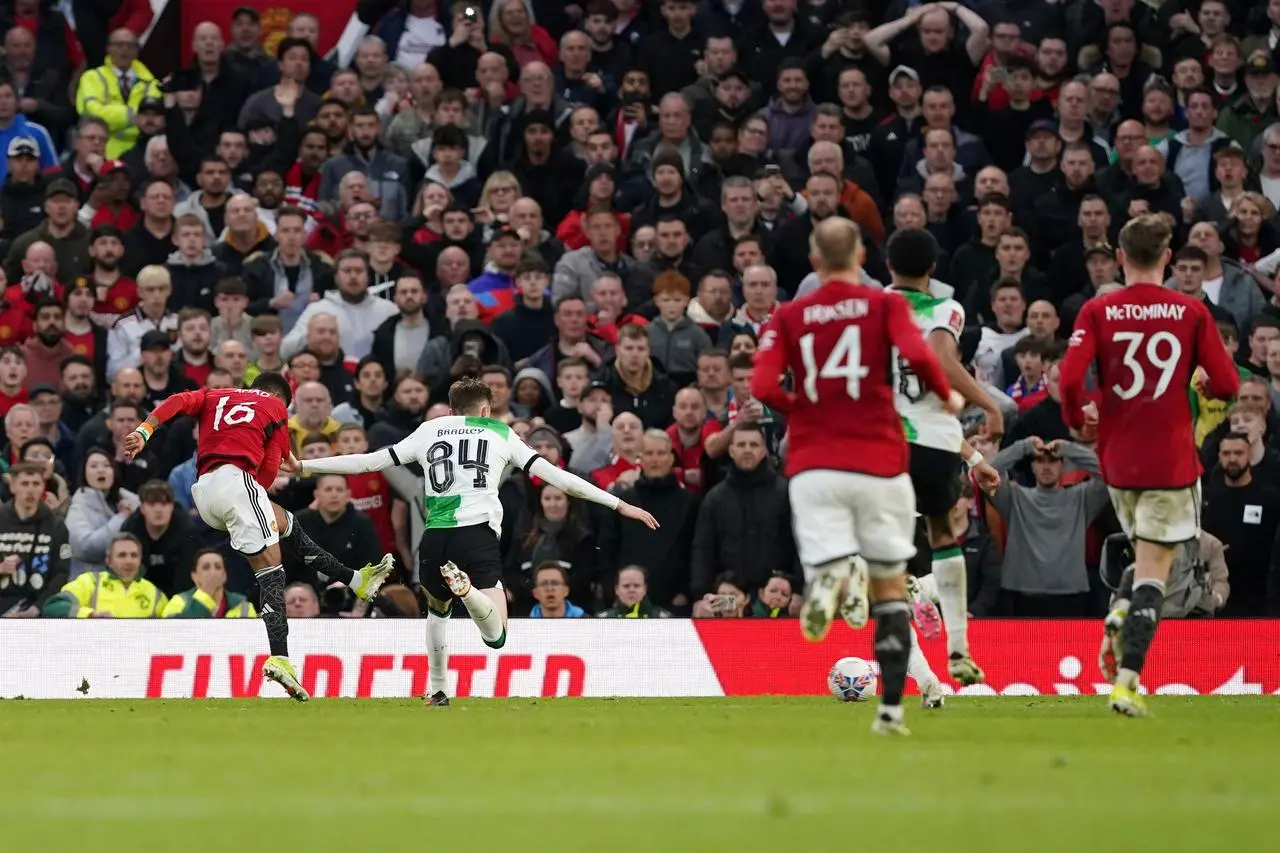 Amad Diallo, left, scores Manchester United’s winner in the FA Cup quarter-final against Liverpool