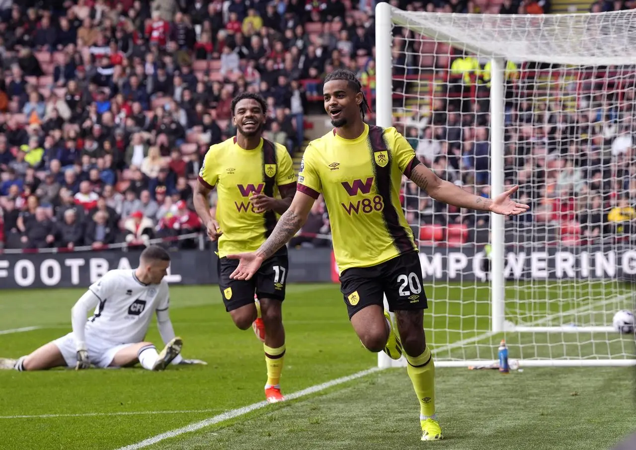 Lorenz Assignon celebrates scoring Burnley's second goal at Bramall Lane