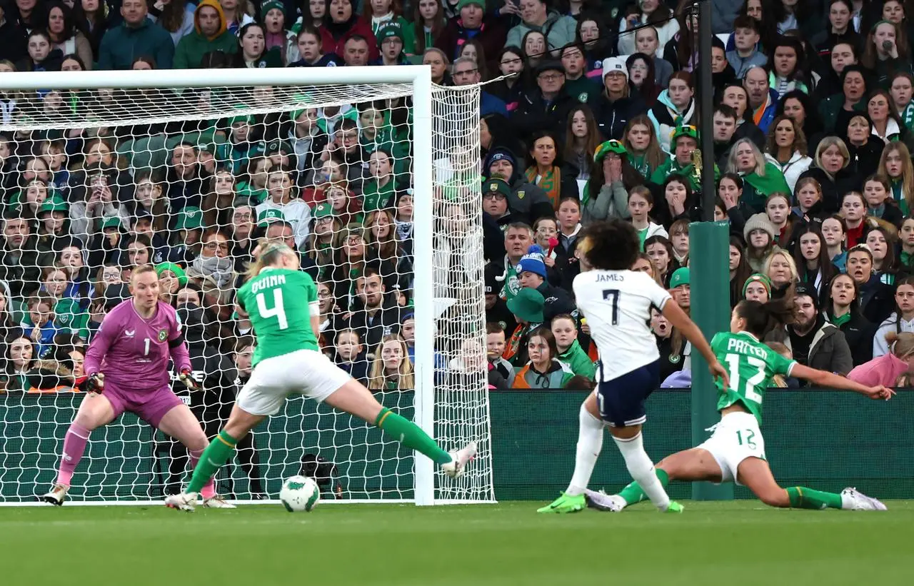 Lauren James, second right, scores England’s first goal