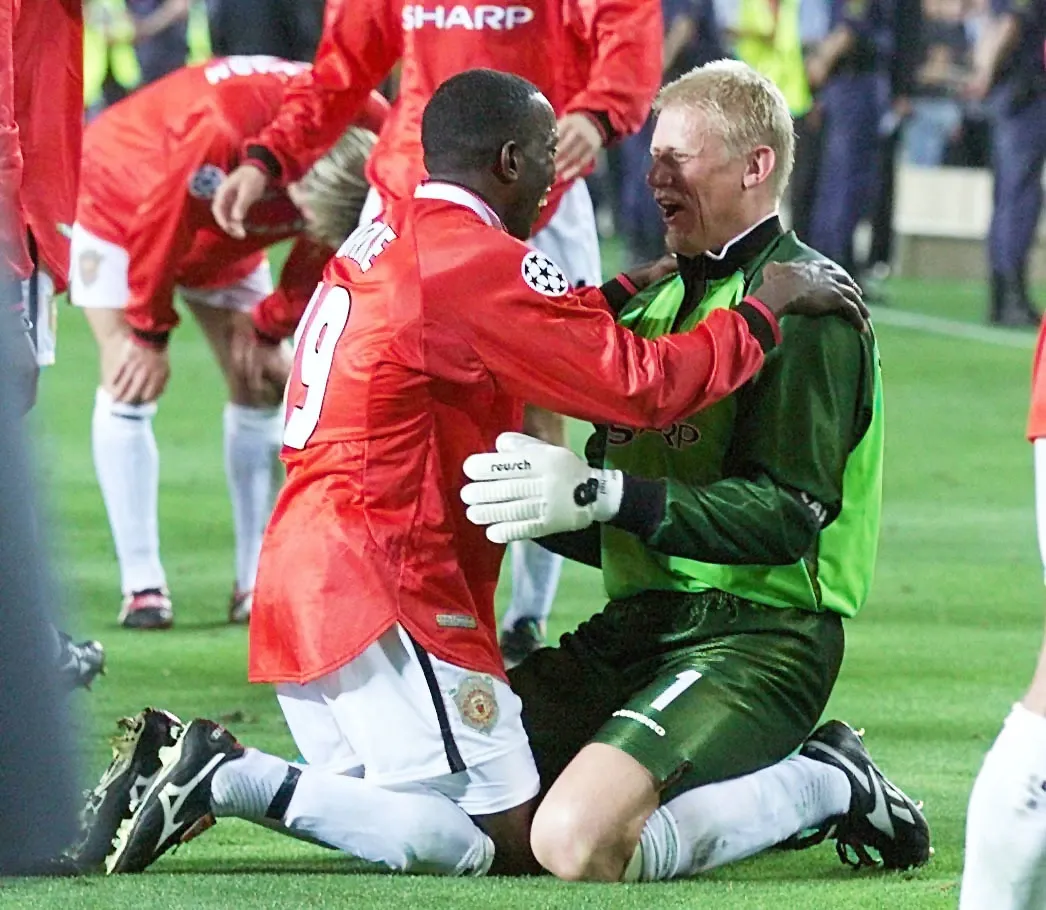Peter Schmeichel, right, and Dwight Yorke celebrate Manchester United's Champions League victory in 1999 