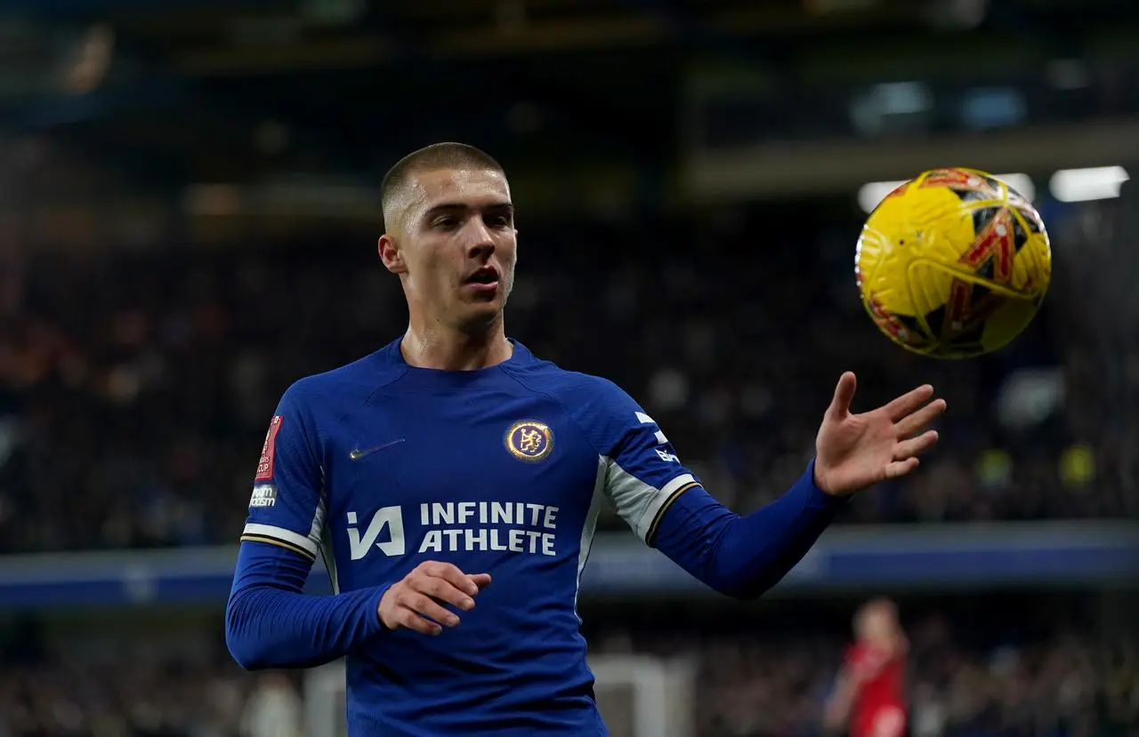 Alfie Gilchrist receives the ball to take a throw-in