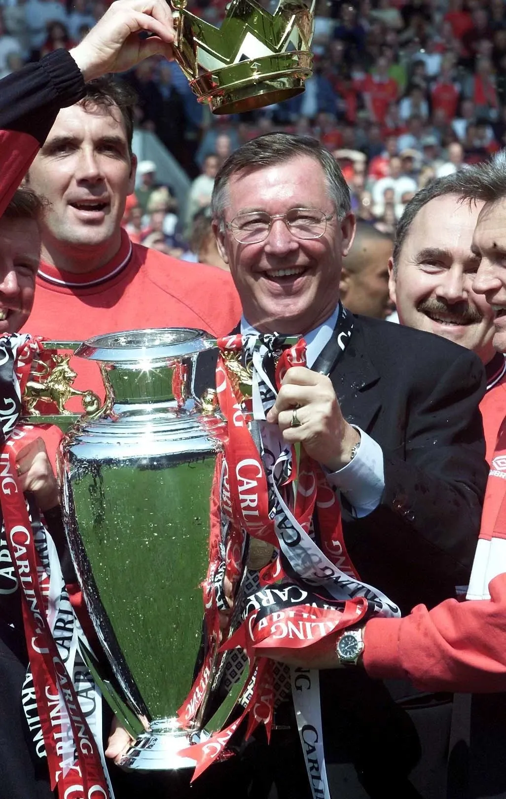Sir Alex Ferguson lifts the Premier League trophy