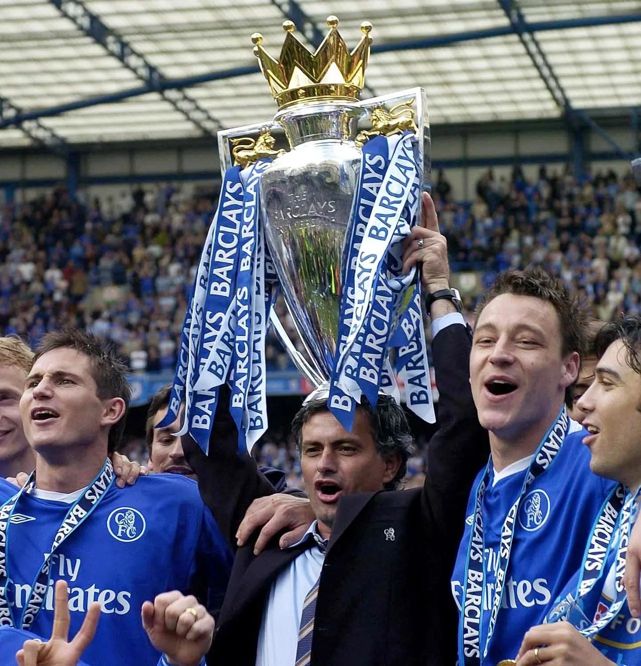 Jose Mourinho lifts the Premier League trophy